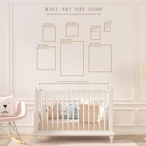May include: Wall art size guide with dimensions in inches and centimeters, shown to scale with a 137.36 cm crib. Includes sizes like 11x14 in (27.9 x 35.6 cm), 12x12 in (30.5 x 30.5 cm), and 20x30 in (50.8 x 76.2 cm).