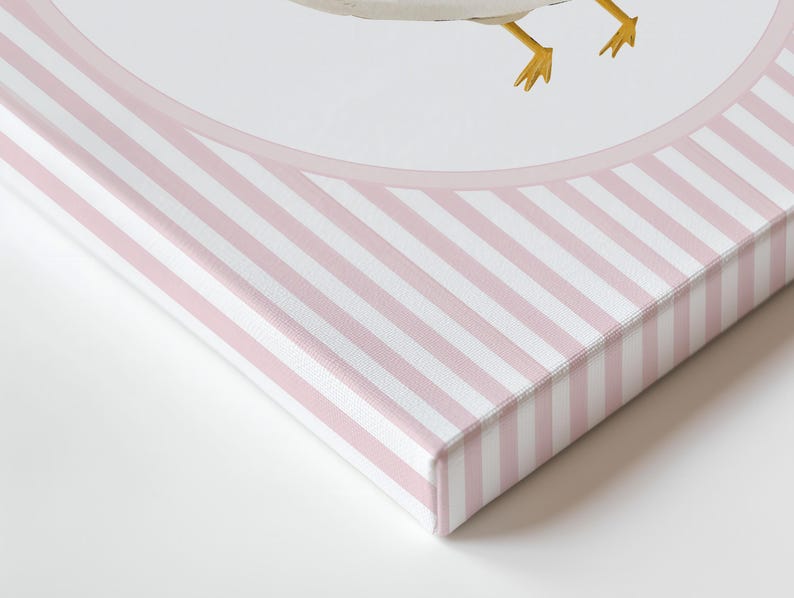 May include: A canvas art print featuring a watercolor illustration of a goose. The artwork is set within a pink and white striped border. The canvas edges are also covered in the pink and white stripe pattern.