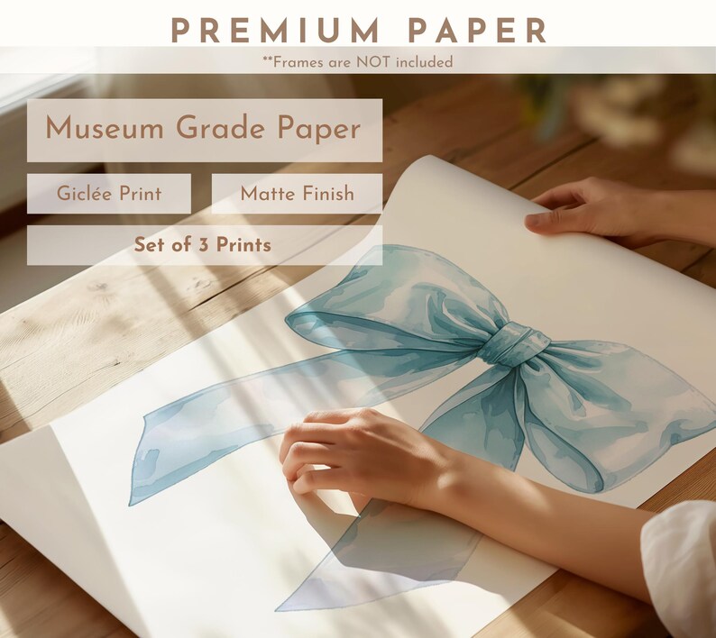May include: A set of three prints on museum grade paper with a gicl&eacute;e print and matte finish. The prints feature a watercolor illustration of a light blue bow.