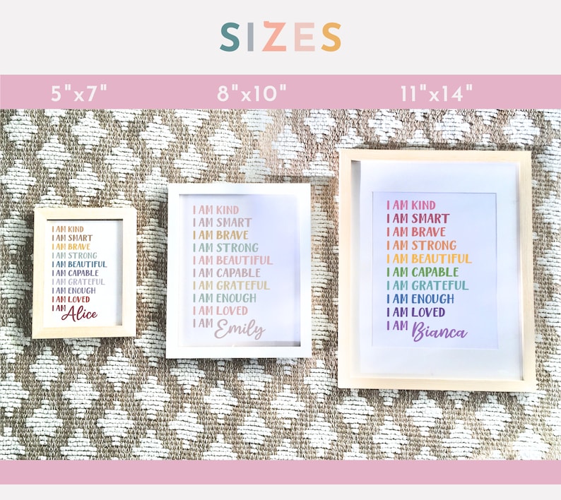 May include: Three framed prints with white backgrounds and rainbow text that reads "I am kind, I am smart, I am brave, I am strong, I am beautiful, I am capable, I am grateful, I am enough, I am loved." The prints are in different sizes: 5x7 inches, 8x10 inches, and 11x14 inches. The names "Alice", "Emily", and "Bianca" are at the bottom of each print.