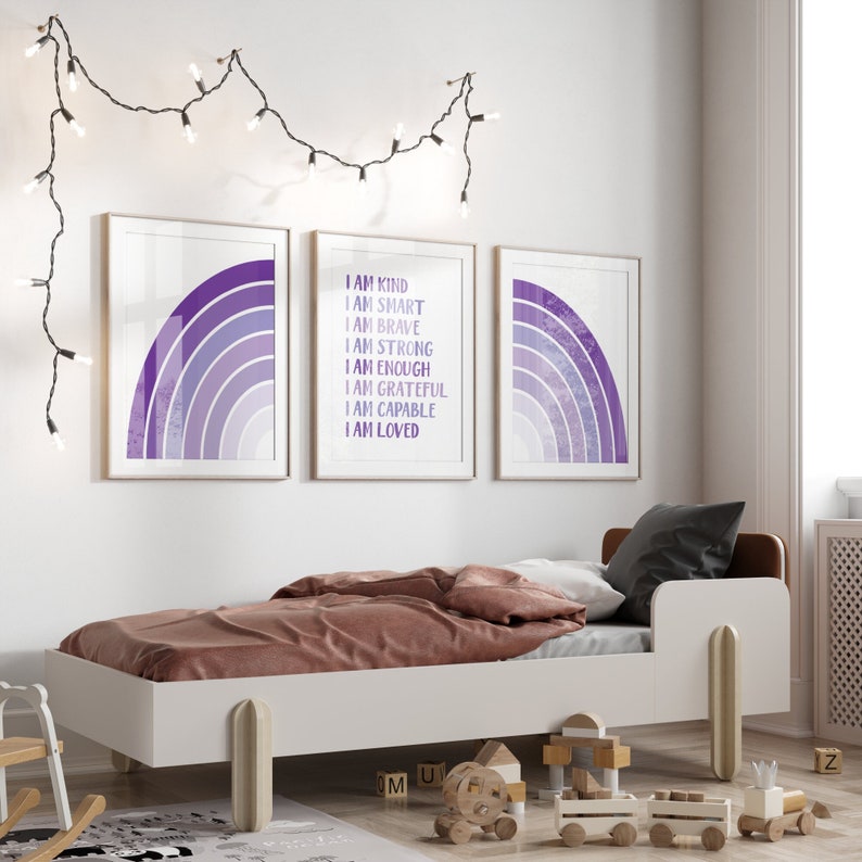 May include: Three framed prints with a purple ombre rainbow design. The center print has the text "I am kind, I am smart, I am brave, I am strong, I am enough, I am grateful, I am capable, I am loved".