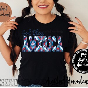May include: A black t-shirt with the text "God Bless America" in blue, red, and white patterned letters. The letters are in a Native American style.