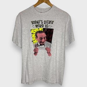 Vintage 1990er Jahre Pee Wee Herman Geheimnis Wort T-shirt (L)