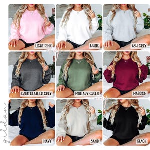 May include: A collage of ten images showcasing different color options for a basic crew neck sweatshirt. The colors include light pink, white, ash grey, dark heather grey, military green, maroon, navy, sand, and black.