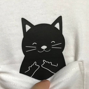 Cat sticking out store middle finger shirt