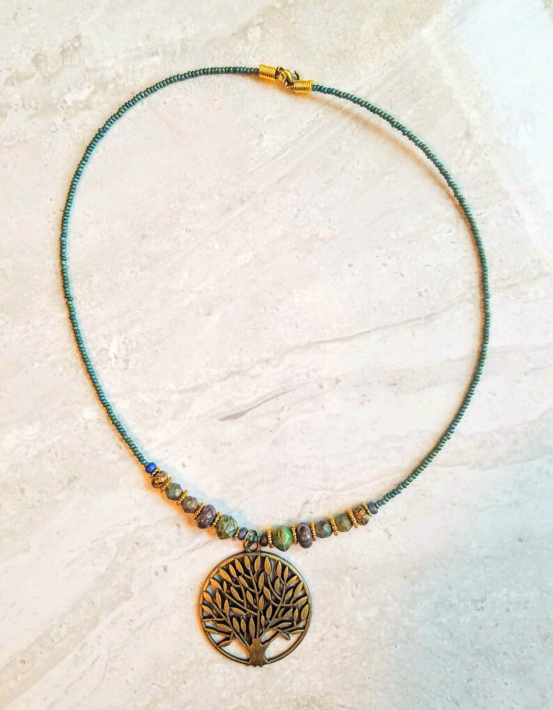 BLD Peg Montana green single strand beaded necklace with brass tree of life pendant
