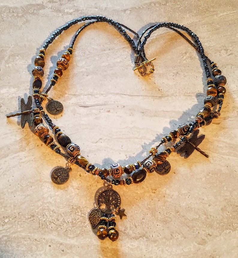 L2SC Peg Montana Necklace 2 Strand Tigers eye and Blue metallic Tree of life dragonflies and star charms