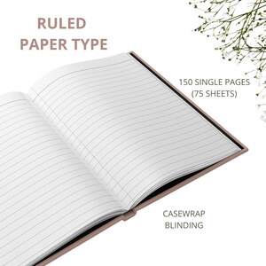 May include: A ruled notebook with 150 single pages (75 sheets) and casewrap binding. The notebook is open to show the lined paper.