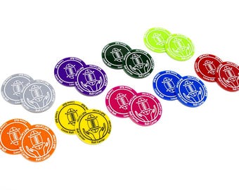 May include: A set of 10 colourful round game tokens with a white football and hands design. The tokens are labelled "Loose Ball" and "Ball Carrier".