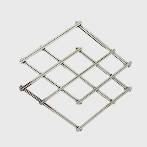 Vintage zilverkleurige metalen uitschuifbare onderzetter