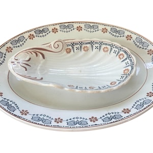 Old oval ironstone dishes from St Amand