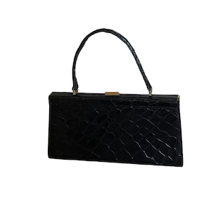 Vintage crocodile-style black leather handbag