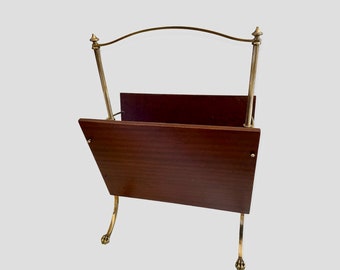 Old magazine rack with claw feet by Maison Jansen
