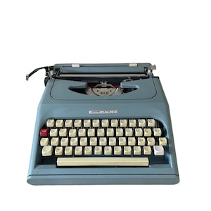 Máquina de escribir vintage Antarès compacta 26
