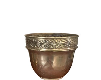 Old embossed brass planter