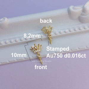 May include: Gold-tone crown-shaped pearl cap with a screw-on back. The cap is 10mm in diameter and 8.2mm in height. It is stamped Au750 d0.016ct. The cap is shown from the front and back.