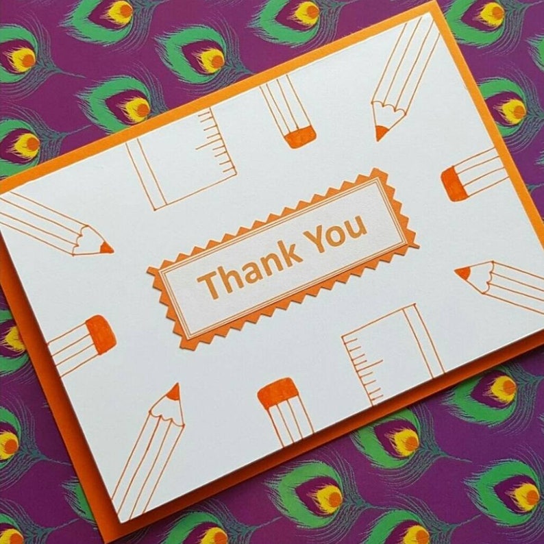 Blank inside Thank you Worldwide shipping available Pencils and rulers Teacher card Orange