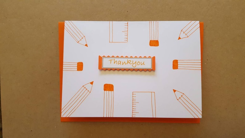 Blank inside Thank you Worldwide shipping available Pencils and rulers Teacher card Orange