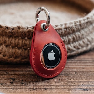 Porte-clés en cuir fait main avec poche pour AirTag - Élégant porte-étiquette, protecteur et idée cadeau unisexe pour collègues et amis