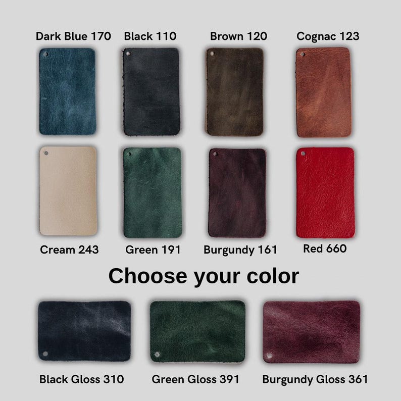 May include: A collection of rectangular leather swatches labeled Choose your color. The colors include Dark Blue 170, Black 110, Brown 120, Cognac 123, Cream 243, Green 191, Burgundy 161, Red 660, Black Gloss 310, Green Gloss 391, and Burgundy Gloss 361.