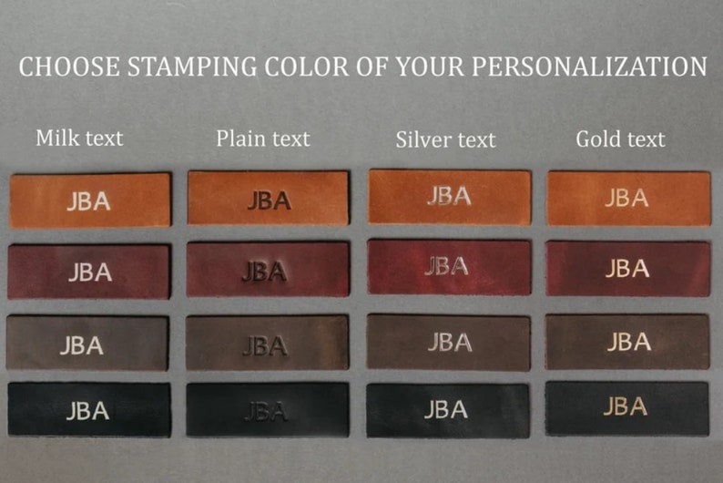 May include: A grid of sixteen rectangular leather swatches in four shades of brown and black, each embossed with the letters JBA. The columns display four stamping options: Milk text, Plain text, Silver text, and Gold text for personalization.