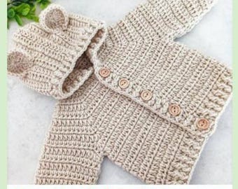 May include: A beige crochet hooded jacket featuring two small bear ears on the hood and five light brown wooden buttons down the front. The text Bear Hooded Jacket and PDF Crochet Pattern by Baby Crochet Designs is visible.