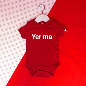 red baby grow