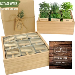 May include: A wooden box with nine small pots for growing herbs. The box has a label that says "Just Add Water, Easy, Fast, & No Mess". There is a separate wooden box with three compartments for growing herbs. The compartments are labeled "Oregano", "Cilantro", and "Basil". There is also a card with the text "mom's tree, Step by Step Instructions".