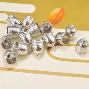 25 Pcs End Cap,Top Cap,White K Cord End Tip,Bead Caps,Leather Cord End Caps 9x13mm