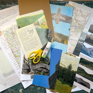 May include: A collection of craft supplies including various printed paper sheets, maps, landscape illustrations, a Pritt glue stick, and yellow-handled scissors. The papers feature text instructions, mountain ranges, and natural scenery.