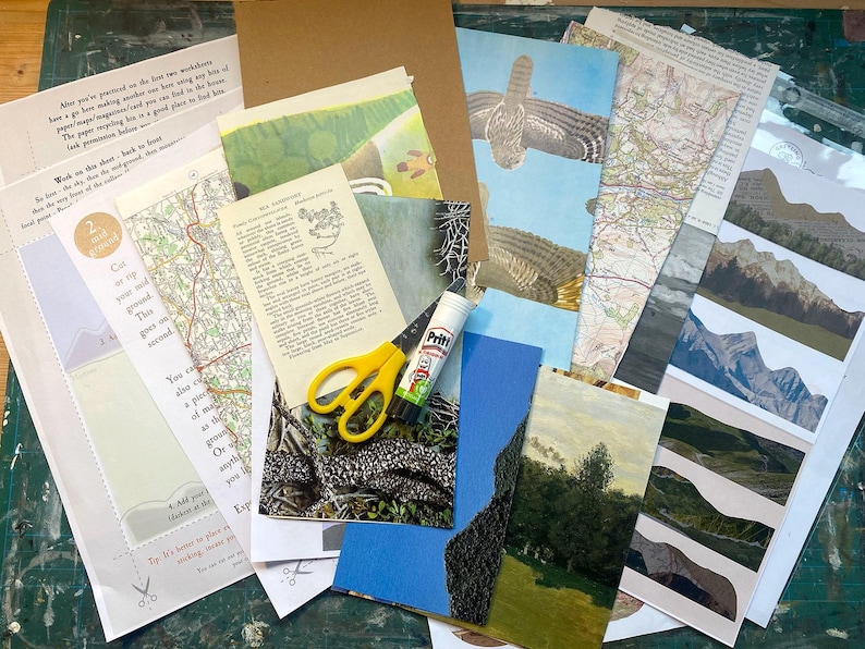 May include: A collection of craft supplies including various printed paper sheets, maps, landscape illustrations, a Pritt glue stick, and yellow-handled scissors. The papers feature text instructions, mountain ranges, and natural scenery.