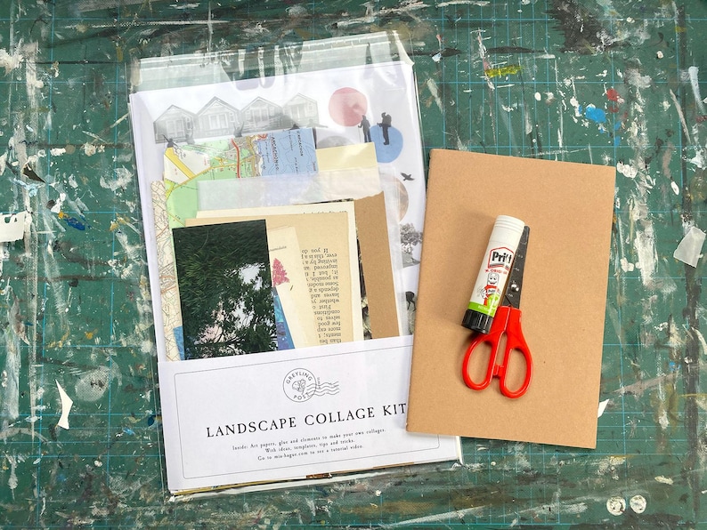 May include: A Landscape Collage Kit with various papers, maps, and images, alongside a glue stick and red-handled scissors on a brown cardboard sheet. The kit is packaged in a clear plastic sleeve, with the words "Landscape Collage Kit" printed on the front.