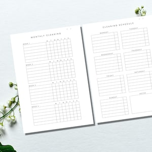 May include: A printable cleaning schedule with a monthly cleaning calendar and a weekly cleaning schedule. The monthly calendar has four weeks with spaces for each day of the week. The weekly schedule has spaces for each day of the week and a notes section.