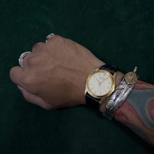 Vintage Ricoh goudkleurig horloge