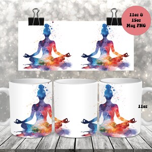 May include: Two white ceramic mugs with a colorful watercolor design of a person in a yoga pose. The design features a silhouette of a person sitting in a lotus position with colorful watercolor splashes around them. The mugs are 11 oz and are available in 15 oz sizes.