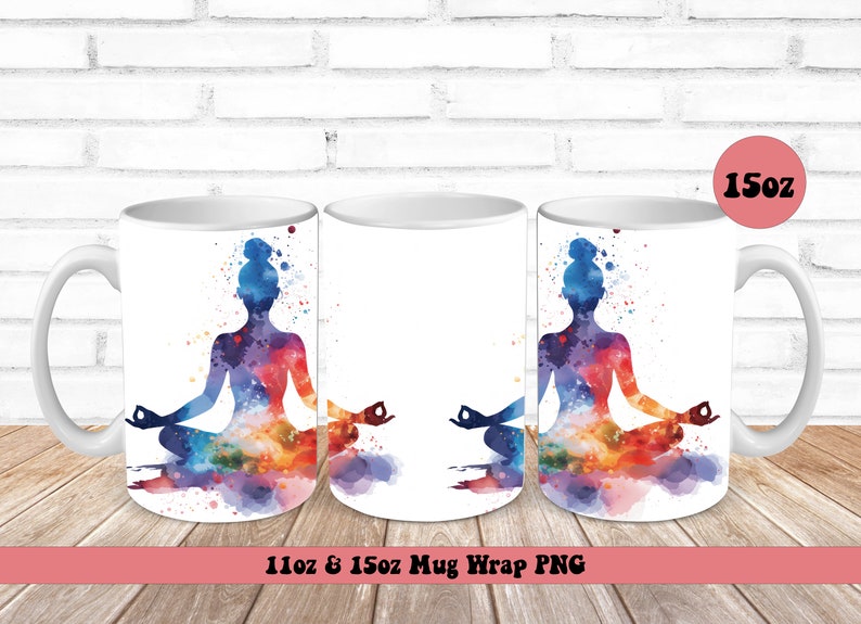 May include: Two white ceramic mugs with a watercolor design of a person in a yoga pose. The design is in shades of blue, purple, orange, and yellow. The mugs are 11 oz and 15 oz.