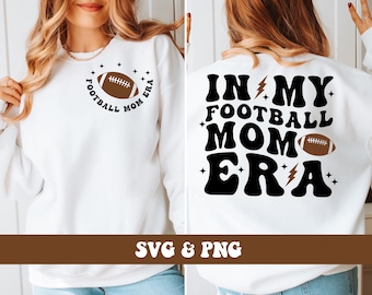 May include: White sweatshirt with the text "FOOTBALL MOM ERA" and a football graphic on the front. The back of the sweatshirt says "IN MY FOOTBALL MOM ERA" with a football graphic and lightning bolts.