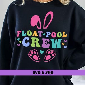 May include: Black sweatshirt with the text "FLOAT POOL CREW" in colorful letters, with bunny ears, paw prints, and hearts. The bottom of the image has the text "SVG & PNG" in a purple rectangle.
