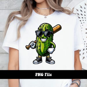 May include: A white t-shirt with a cartoon pickle wearing sunglasses and holding a baseball bat. The pickle is green with brown eyes and a smiling mouth. The text "PNG File" is printed below the image.
