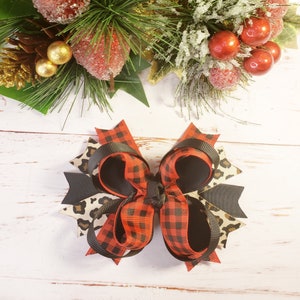 Leopard and plaid hair bow, red and black buffalo pattern, Christmas hairbows for little girls and toddlers, ponytail hairclips accessories