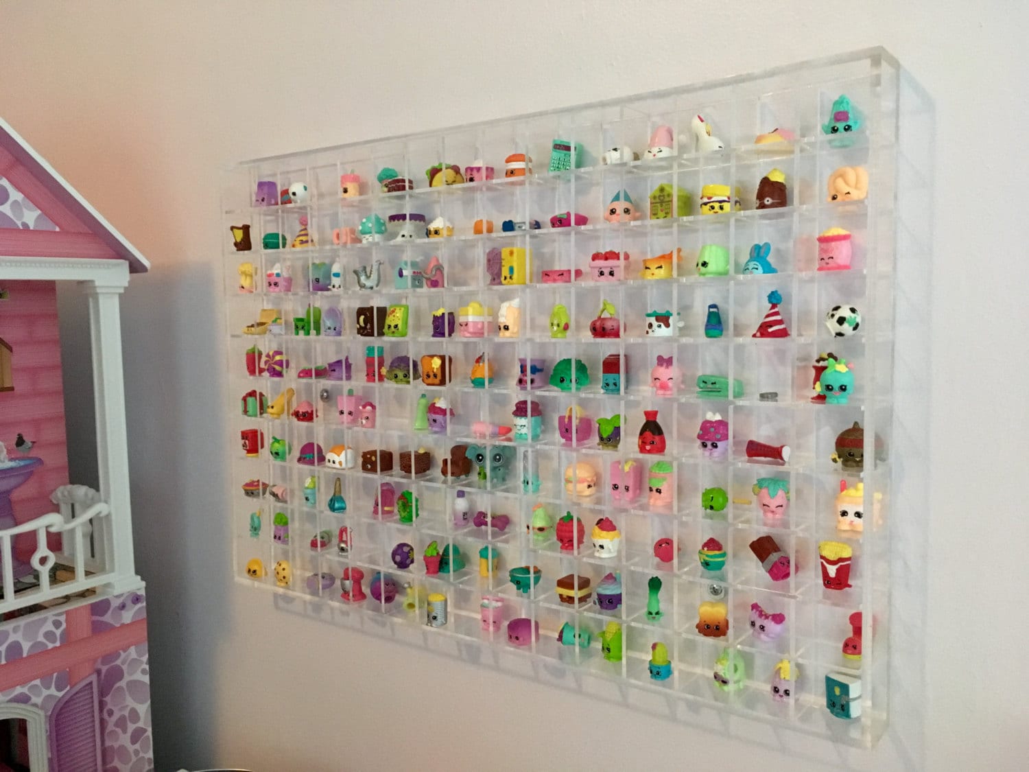 Shopkins lot of 48 with display case