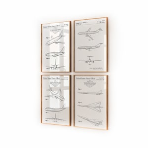 May include: Set of four vintage-style prints featuring black and white line drawings of different airplane designs. Each print has a "United States Patent Office" header and includes the patent number and date.
