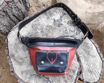 Two-in-one black and red leather bag and fanny pack.