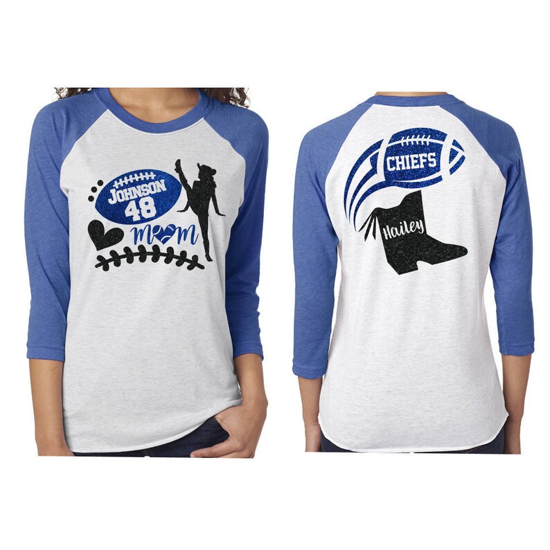 May include: Two white and blue baseball shirts. The left shirt has a football with the text "Johnson 48" and a cheerleader silhouette with a heart and the text "Mom". The right shirt has a football with the text "Chiefs" and a boot with the text "Hailey".