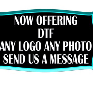 May include: A turquoise and black sign with the text "NOW OFFERING DTF ANY LOGO ANY PHOTO SEND US A MESSAGE".