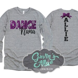 May include: Gray long-sleeved shirt with the text "Dance Nana" in purple glitter on the front and "Allie" in black text on the back.