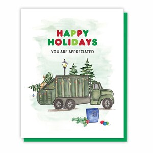 May include: A green garbage truck with Christmas lights and a Christmas tree in the back. The truck is driving on a watercolor background with the text "Happy Holidays You Are Appreciated".