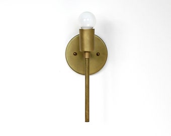 Trek Torch - minimal brass wall sconce lamp light contemporary modern fixture