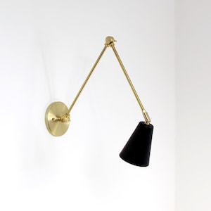 Brass articulating wall hot sale sconce