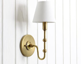 Oyère Wall Sconce -- brass curved arm light fixture lamp linen shade